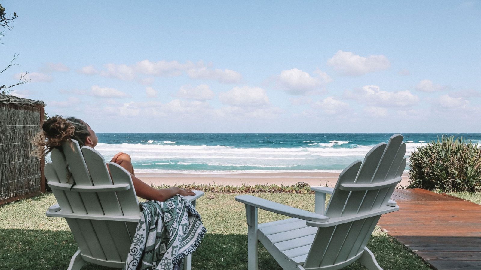 Umi Boomerang Beach lawn chairs with beach view