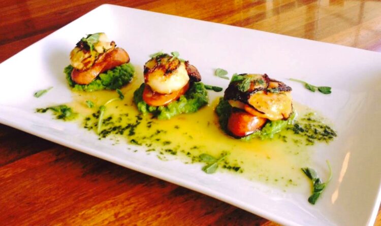 Grilled scallops at the Bunker Bar within Tallwoods Country Club.