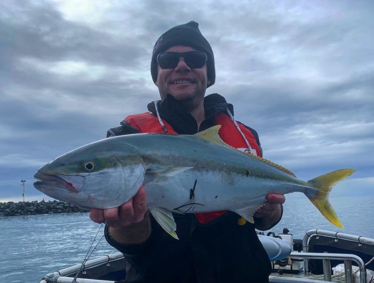 Like with a yellowtail kingfish caught between the breakwalls